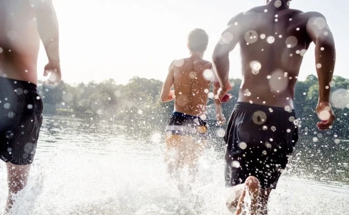 Renew Youth Brand Photography - Men running in shallow water