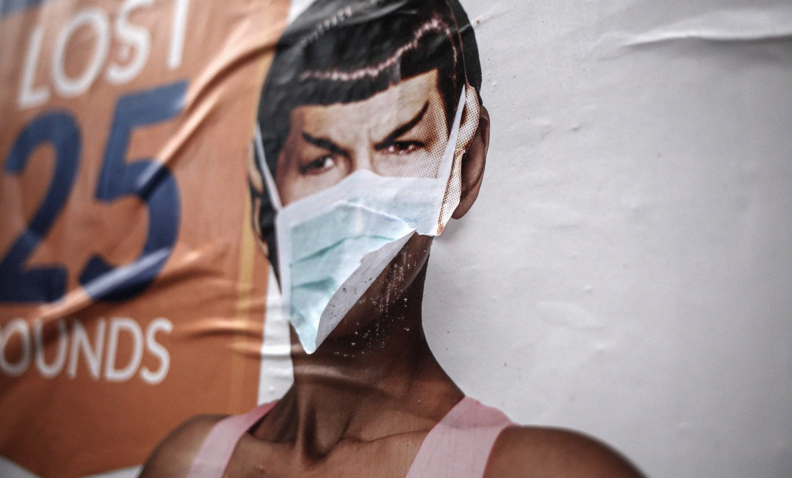 Poster bill on wall of Spock with surgical mask applied to face